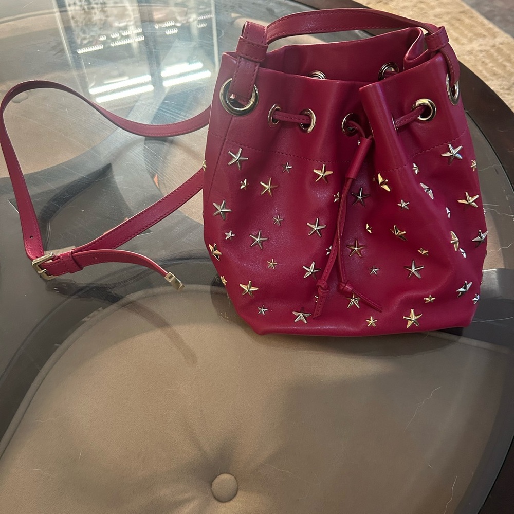 Jimmy Choo Stylish Red Bucket Bag with Star Accents